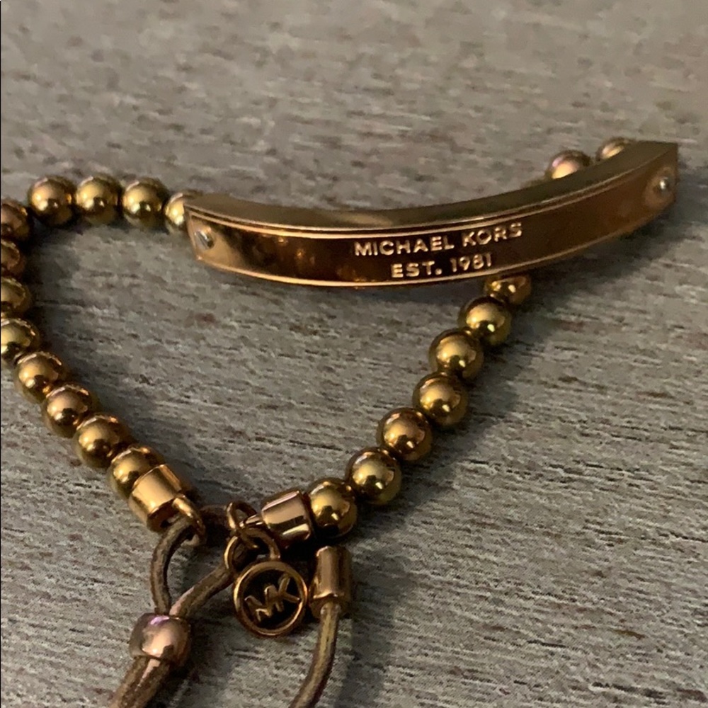 Michael Kors gold bracelet with gold beads